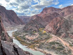 A river running through a canyon Description automatically generated with medium confidence